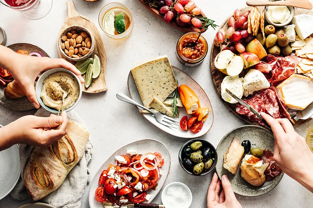 Snacking-Charcuterie-board-spread-of-snacks-overhead