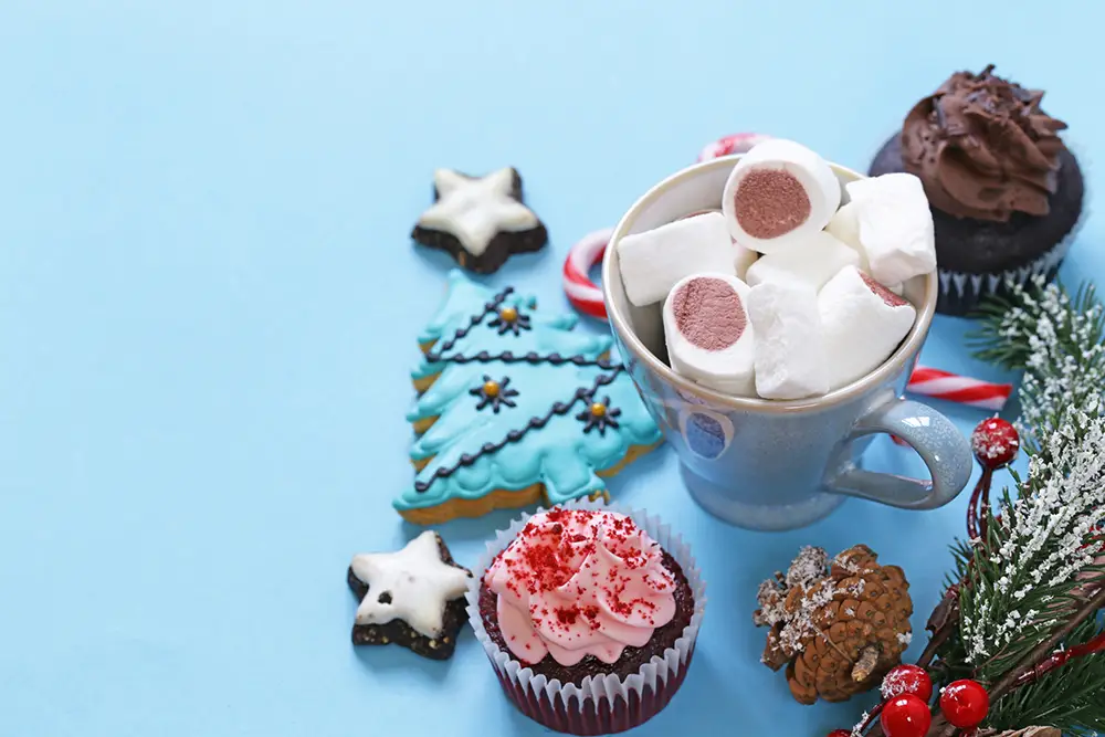 Christmas-gingerbread-cookies-on-blue-background-baked-goods