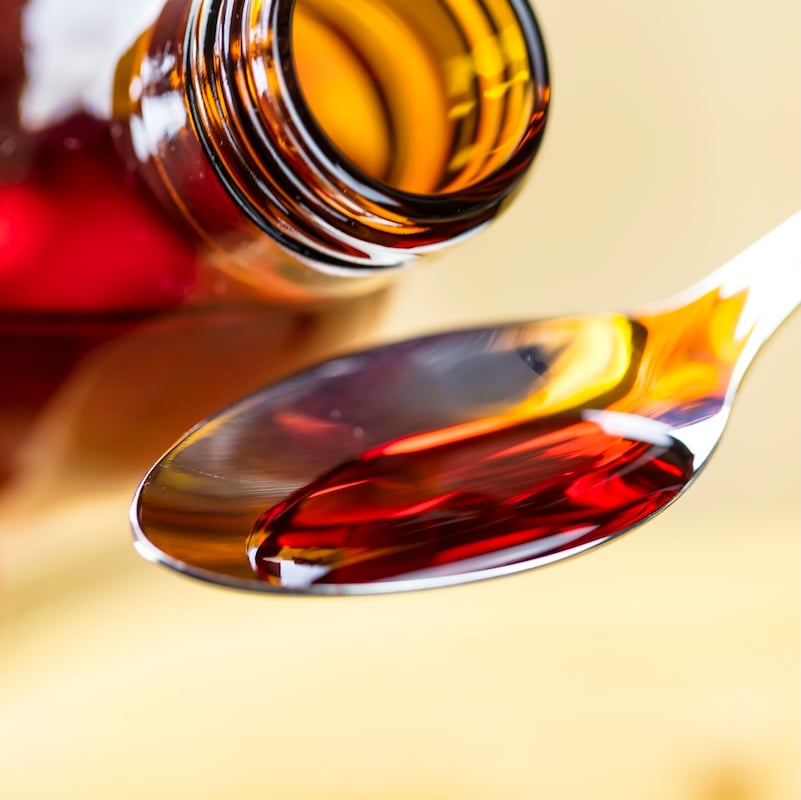 Syrup medicine on a spoon